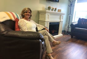 Western Hospital director of nursing, Sue Lapierre, relaxes in one of the comfortable chairs in an unoccupied Family-Partner in Care room in the hospital’s new palliative care wing.