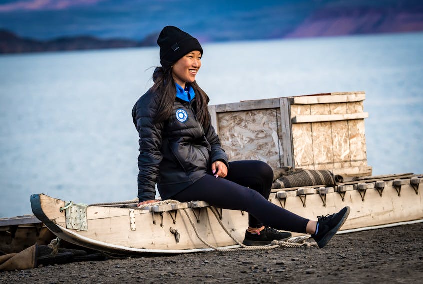 Emma Lee Lyon exploring life in the High Arctic.
Photo by Martin Lipman, SOI Foundation