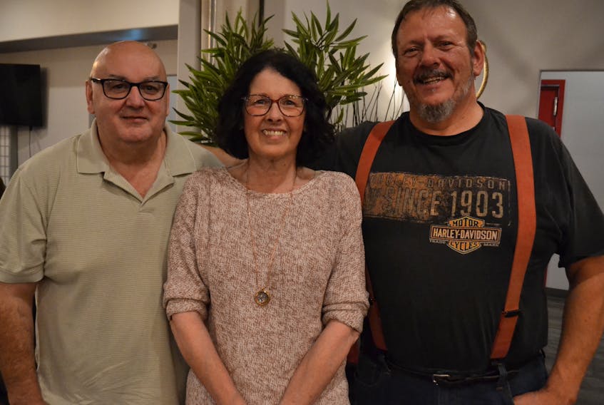 Paul Shea, from left, and Joanne and Tommy Perry have crafted a faithful following on Tignish Talk, a group Facebook page where they share their take on the Tignish 'Word of the Day'. Their list of followers has grown to 6,345.