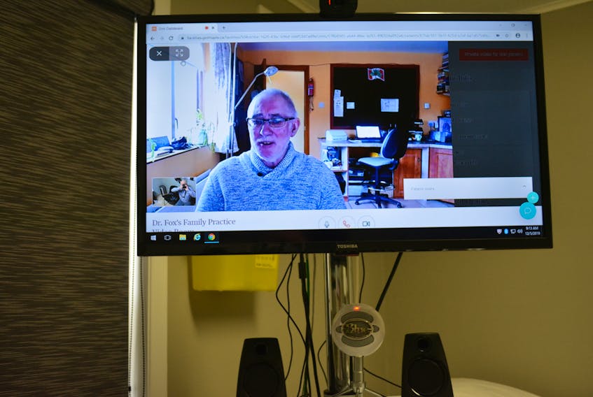 Dr. Declan Fox, from his home office in Ireland, appears on a computer monitor at the Tignish Health Centre. He is piloting a virtual care clinic in Tignish while recruitment efforts to find a full-time replacement continue. 
Eric McCarthy/Journal Pioneer