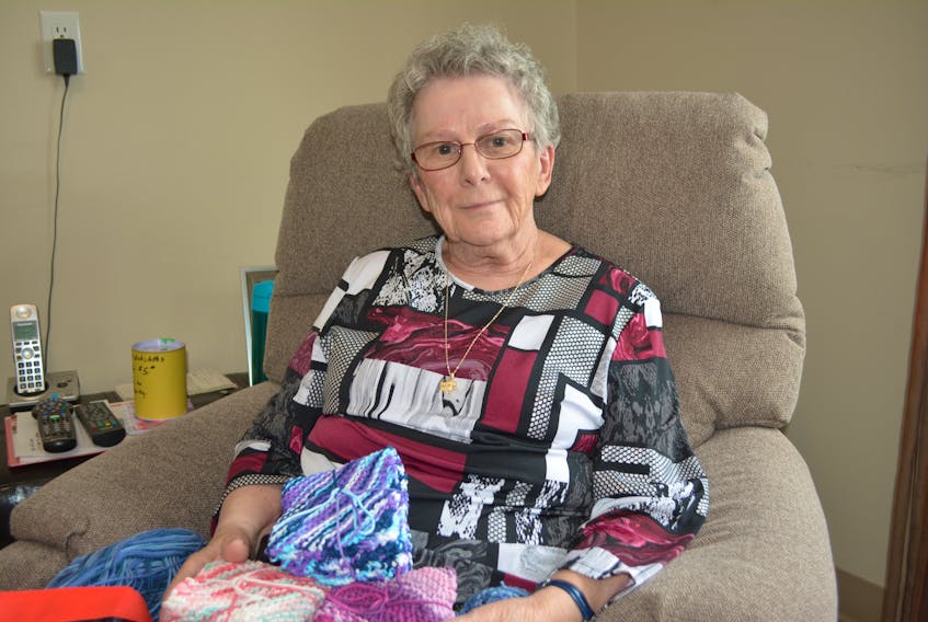 Mary Ann Nelligan, a resident of the Tignish Seniors Home, occupies her free time by knitting dishcloths in support of a Prince Edward Island missionary priest’s work in Brazil.