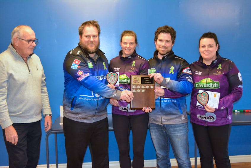 P.E.I. Curling Club director Bill Smith, left, presents the Newson rink from the Silver Fox with the P.E.I. mixed curling championship plaque. From second left are Jamie Newson, Melissa Morrow, Andrew MacDougall and Miranda Ellis.