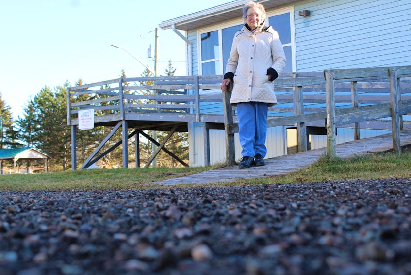 Dianne Doucette, president of the Kensington Senior Surfers, outside that group’s headquarters, the Kensington Seniors Centre. A new agreement between the Town of Kensington and the Rural Municipality of Malpeque could see the building’s parking lot paved.