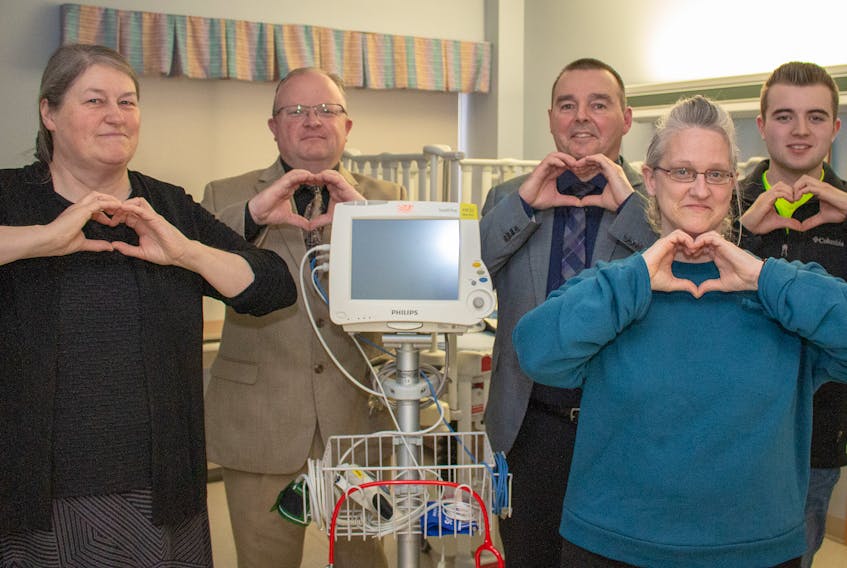 Mary Noye, Pastor Rev. Sean Ward, Billy Shaw, Josh Ward and Cindy Aalbers, members of the Summerside United Pentecostal Church organizing committee, proudly show they “heart” the Prince County Hospital, in the signature pose of the PCH Foundation’s cardiac campaign this year.