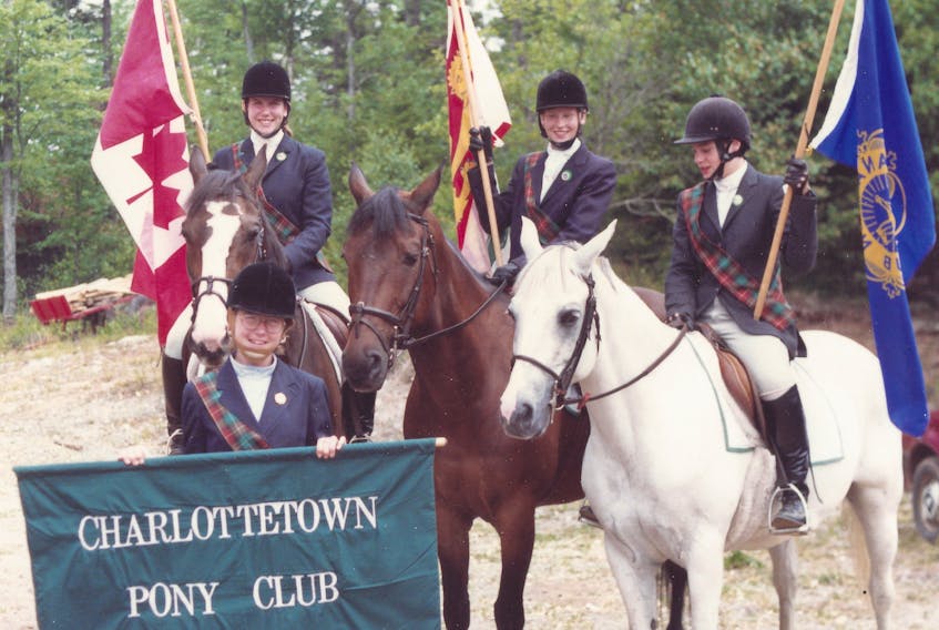 Charlottetown Pony Club members are shown at a Regional Rally in Nova Scotia in the early 1990s. Mounted, from left, are Heather (Newson) Lizama, Lindsay Robb and Allyson MacDonald. Standing is Kelda Lawlor.