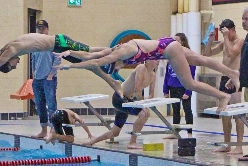 Matt Penner (left) and Lily Poffenroth practice their dive during an early season session for the Port Hawkesbury Antigonish Swim Team (PHAST). Corey LeBlanc