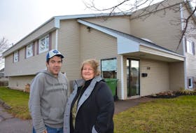 Dylan Allen, a Community Connections Inc. client, and Karen Rowe, community support worker, outside the agency’s n Court Street building. The hope is to renovate and expand the facility, if an application for federal funding is approved.