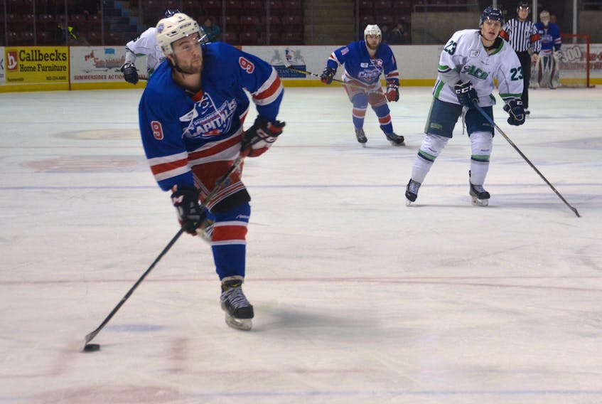 Summerside D. Alex MacDonald Ford Western Capitals forward Alex Hambly fires a shot on goal Tuesday at Eastlink Arena.
