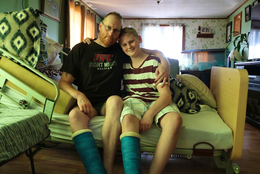 Jason, left, and Chandler Marshall. Chandler and Jason were in a motorcycle crash on July 10 which totaled the motorcycle and the other vehicle involved. Jason suffered a broken leg and foot, a large wound on has with the trauma causing a part of his rectum to be removed. Chandler suffered road rash and a broken ankle.