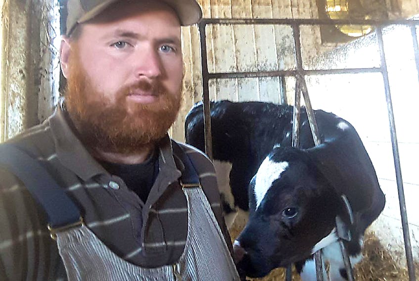Daniel MacDonald of Glendairy Holsteins Farm in Glengarry, was one of thousands of Canadian Dairy Farmers who woke up Monday to news that their industry will be expected to make concessions so Canada can sign the new United States-Mexico-Canada Agreement.