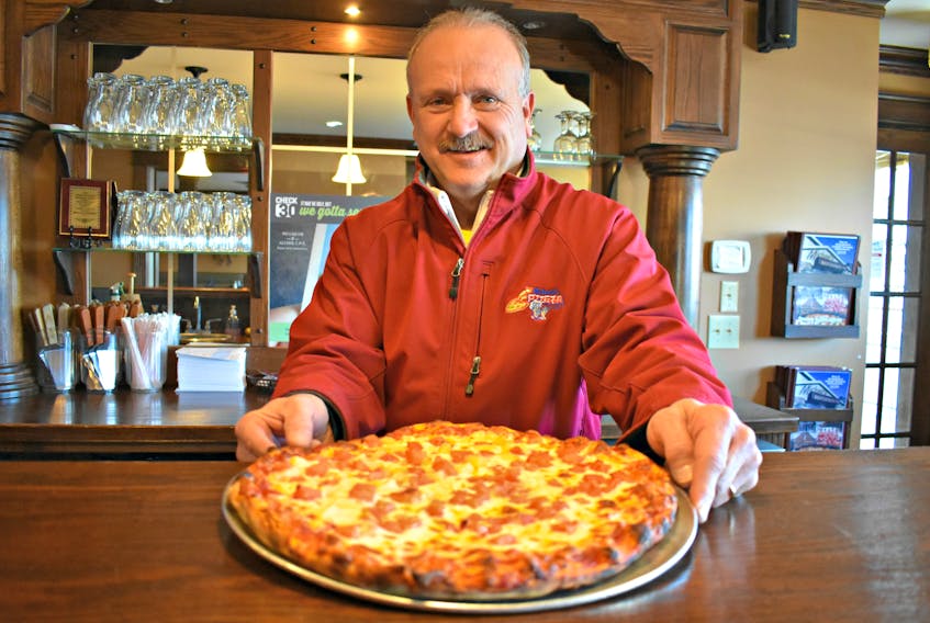 Michael’s Pizzeria owner Robert Gallant said Super Bowl is one of their busiest days of the year for selling pizza.
