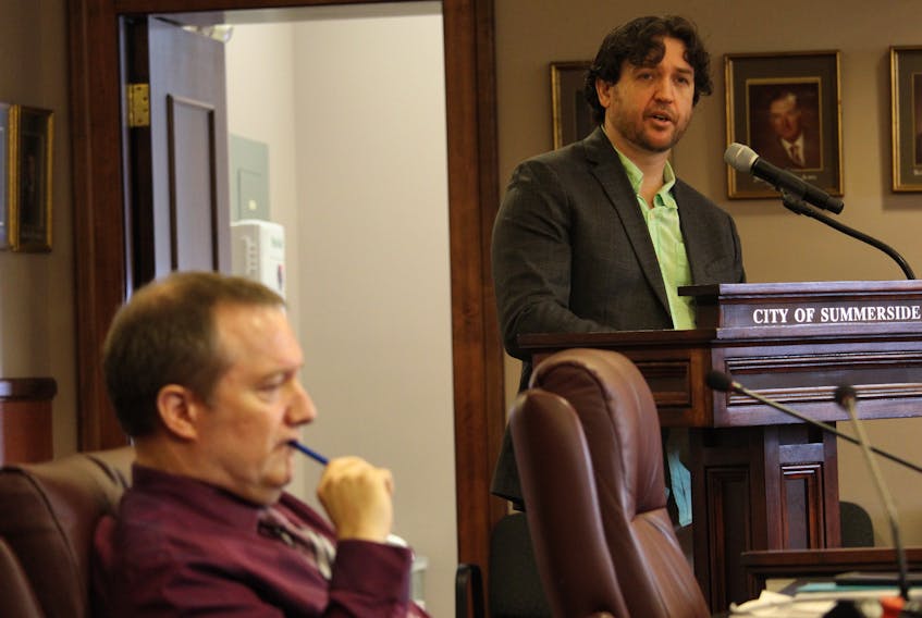 Steve Howard, right, addresses Summerside City councillors during a recent committee of council meeting. Howard presented to council about his concerns over the city’s possible deal with Kore Energy to install a $23 million generator.