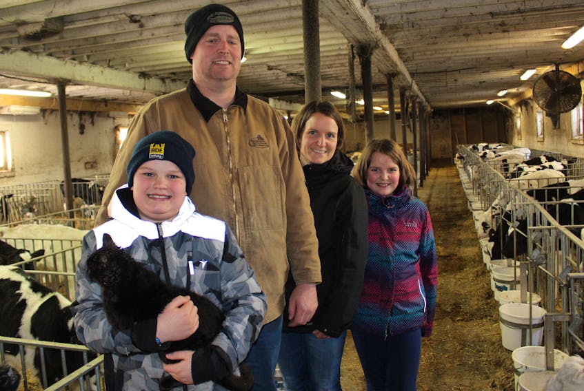 Thomas, 9, left, Randy, Mavis and Taylor, 11, have all been part of 4-H. Now the Drenth kids are following in their parents’ footsteps by showing calves in 4-H competitions, fairs and other expos.