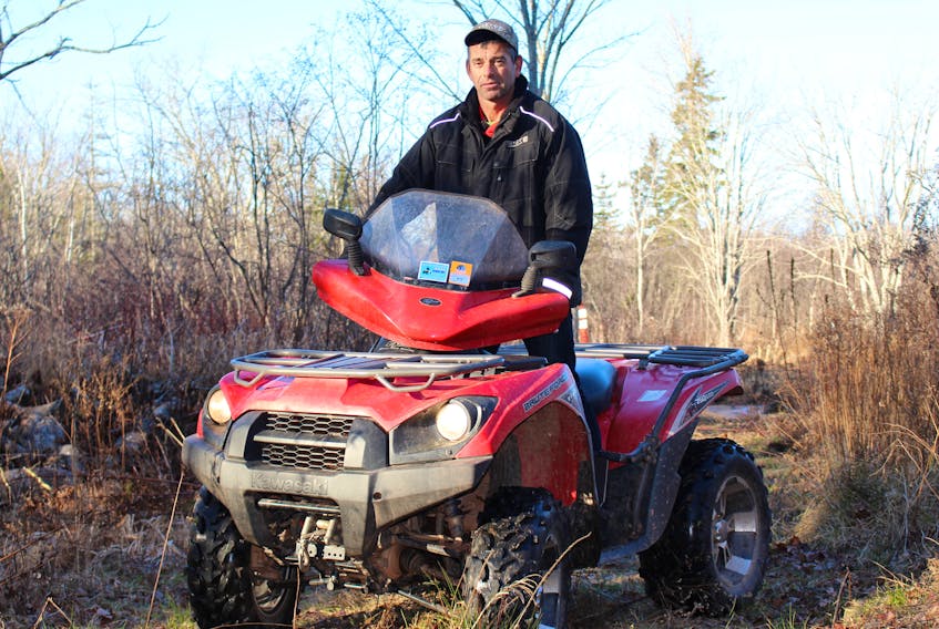 JP Gallant, president of the Evangeline ATV Club, riding on trails in the areas frequented by his club. Many of the trails are still closed off because of the soft ground.