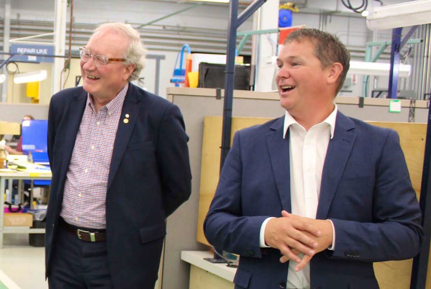 Premier Wade MacLauchlan, left, and StandardAero Summerside president Jeff Poirier are shown on a walk-through Monday of the company’s facility in Slemon Park.