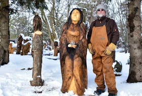Summerside chainsaw carver Wayne Ellis reveals his newest wood creation, Danu, the Celtic goddess of nature. Danu stands six feet high in his backyard, while overlooking wild animals and mythical creatures that sprout from under a fresh blanket of snow.