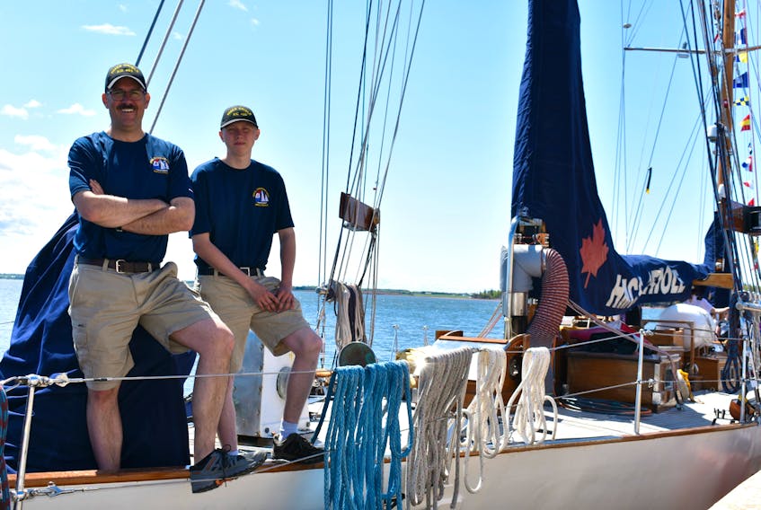 The coxswain on the HMCS Oriole Adam Yardy, from the left, and Ordinary Seaman Dillan Jermey.