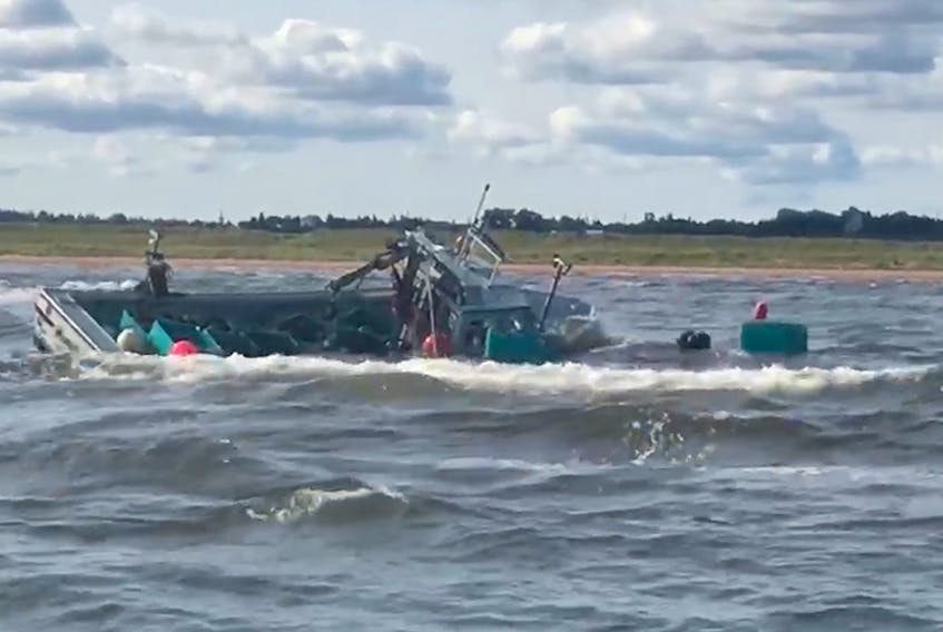 A full mussel boat ran aground as it tried to return to port off Malpeque Harbour Friday afternoon. All aboard were rescued.