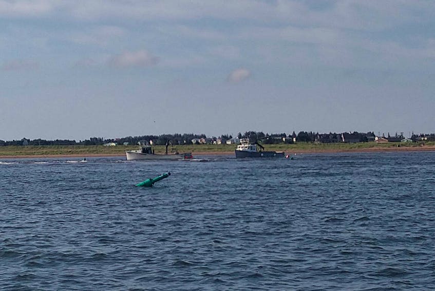 A mussel boat working for P.E.I. Aqua Farms got stuck trying to navigate the Malpeque Harbour channel Monday morning. One of its sister vessels got stuck and swamped in the same channel four days ago.