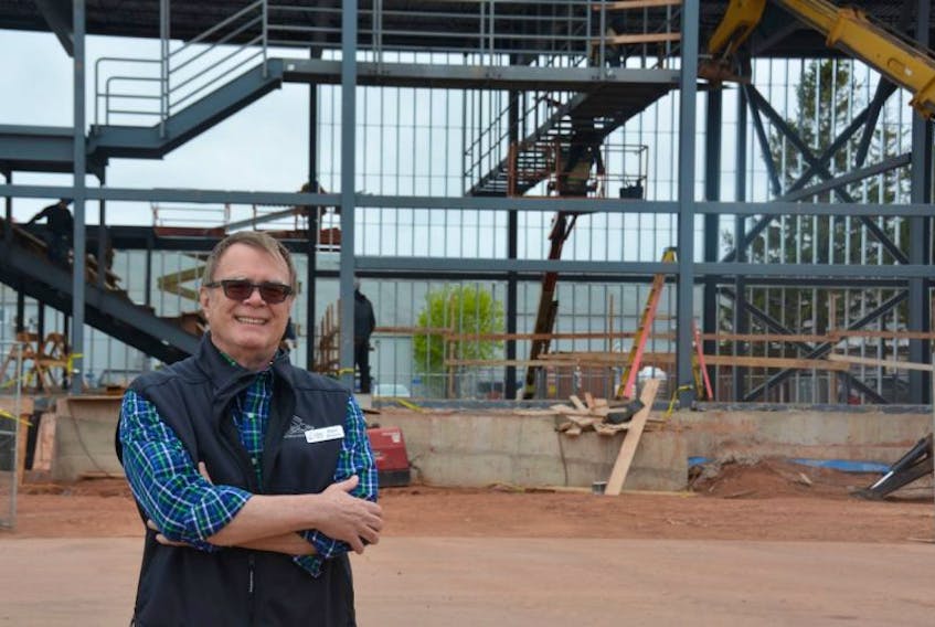 Roger Downie, business manager of College of Piping and Celtic Performing Arts of Canada, outside the Summerside facility’s new addition, the Scott MacAulay Celtic Performing Arts Centre. The new section, which replaces the college’s old amphitheatre, is expected to be completed by November.