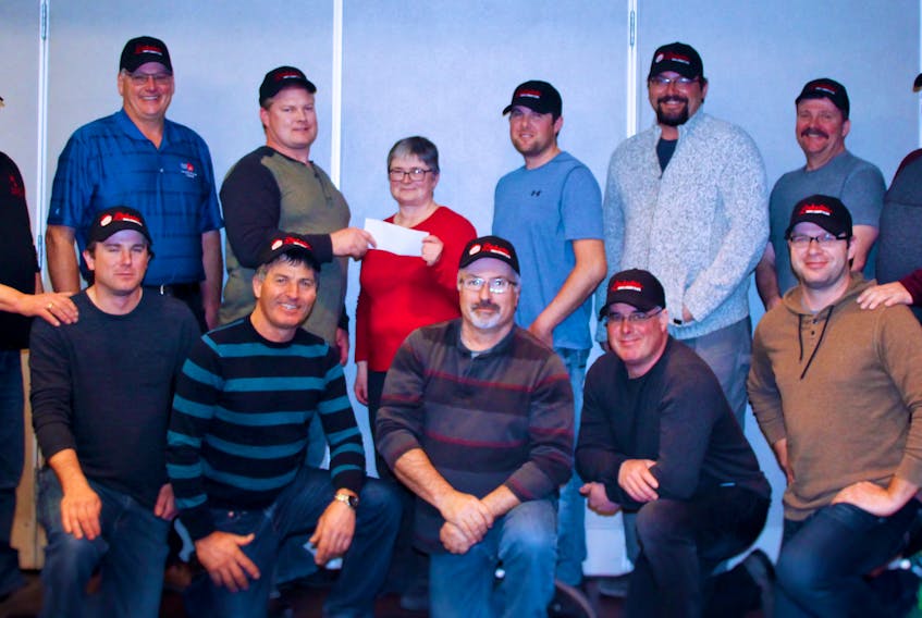 Marlene Campbell, Cultural Programming Coordinator with Culture Summerside – Summerside Lobster Festival Inc., attended a recent meeting of the Lobster Fishers of Prince Edward Island Board for the official launch of the presenting sponsorship. Back row, from left: Robert (Bobby) Jenkins (PEIFA, ex-officio), Craig Avery, Charlie McGeoghegan, Marlene Campbell, Ryan Peters, Brodie Creed, Ken LeClair, Wayne Campbell. Front row (left to right): Tyler Pickering, Lee Knox, Kevin Robertson, Stephen MacPhee, and Malcolm Ferguson