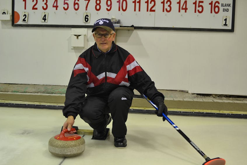 Clair Sweet, a member of the Maple Leaf Curling Club from before it opened, throws some practice rocks. The club is hosting a 40th anniversary bonspiel this weekend, hoping to attract 40 teams.