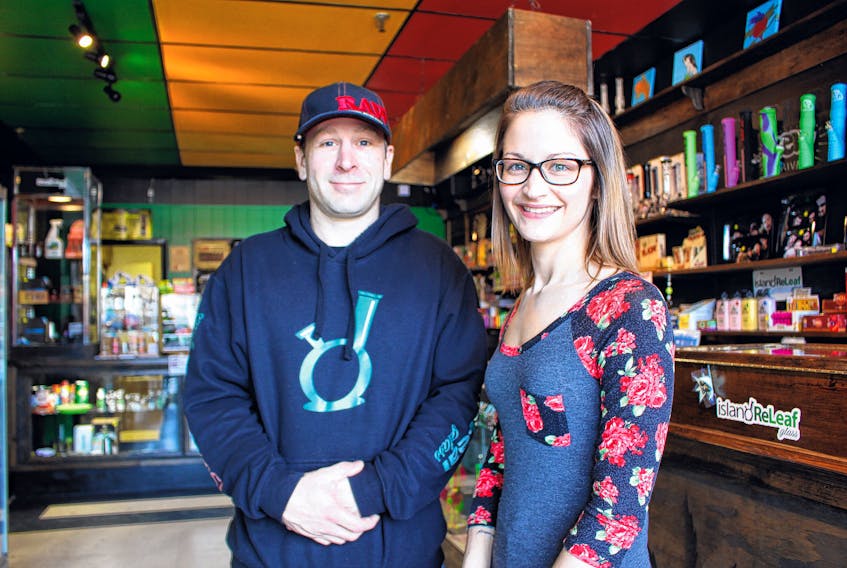 Tommy Biggar, left, and Megan Patey, business partners and co-owners of Island ReLeaf Glass are looking forward to marking one year in business and continuing to see the stigma surrounding medical and recreational marijuana dissipate.