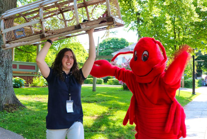Elise Durie, left, and “Lori the Lobster” (Jessica Noonan) can’t wait to see lobster fishers and crews face off in the Lobster Carnival’s Journal Pioneer Lobster Trap Stacking Contest set for July 12 at 7 p.m.