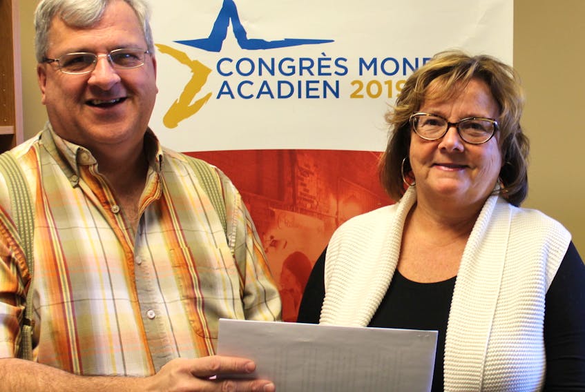 Raymond J. Arsenault, events co-ordinator with the Acadian and Francophone Chamber of Commerce of P.E.I., left, and Karen Gallant, P.E.I. liason officer with the Congrés Mondial acadien 2019, discuss the information meeting planned for Jan. 24 in Abram-Village to present business opportunities surround the CMA.