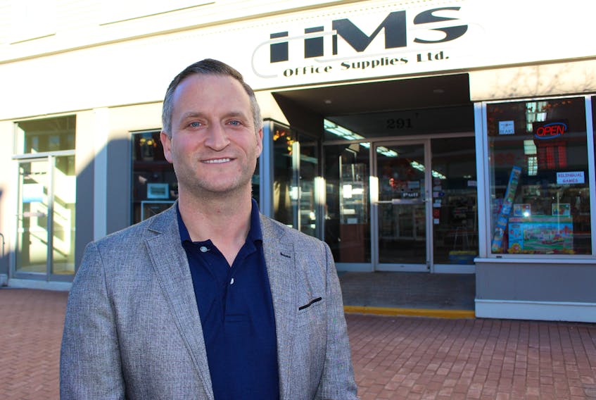 Pierre Gallant, vice-president of sales for HMS Office Supplies, outside the Water Street location in Downtown Summerside.