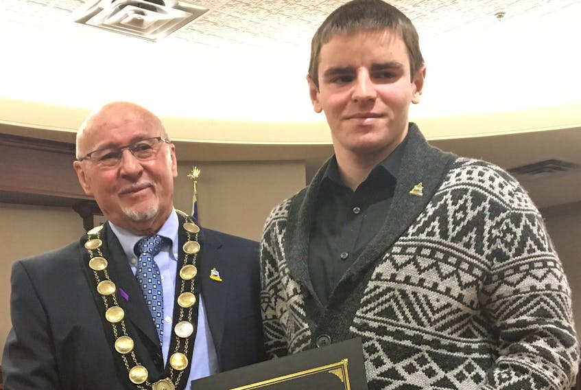 Summerside Mayor, Bill Martin, presented Dylan Corbett, with the Youth Volunteer of the Year Award during Friday’s Culture/Heritage Awards at city hall, Friday.