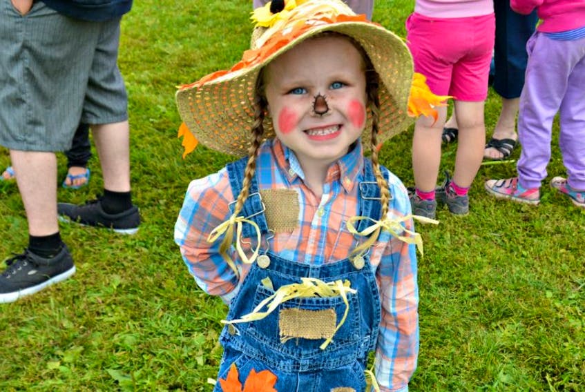 ['Four-year-old Summer Hankinson came all dressed up for the Scarecrow Festival.']