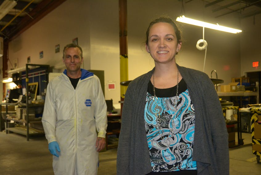 Eddie Strongman, left, and Jenn MacWilliams, employees of Tube Fab Aerospace, have encountered Charlie the ghost who has made his presence known at the former Kohltech window manufacturing plant in Summerside. Millicent McKay/Journal Pioneer