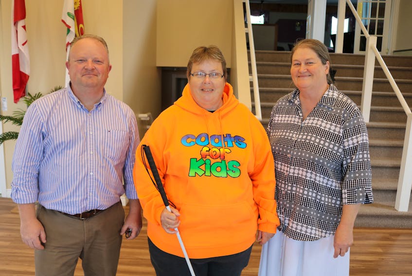 Pastor Sean Ward, left, of the Summerside United Pentecostal Church, Sandra Gallagher, organizer of the 2018 Coats for Kids campaign, and Mary Noye, community care operator of the church, are excited to announce that Coats for Kids 2018 is going ahead.