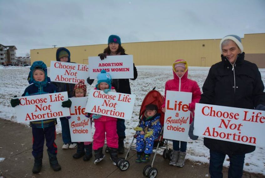 Pro-Life supporter Mary Beaulac brought seven of her nine children to attend the anti-abortion rally in front of Prince County Hospital on Saturday morning. Six of her children are pictured (from the left): Albert, 7, Sebastian, 11, Martha, 3, Gabriela, 5, 18-month old Christopher and Clare, 9.