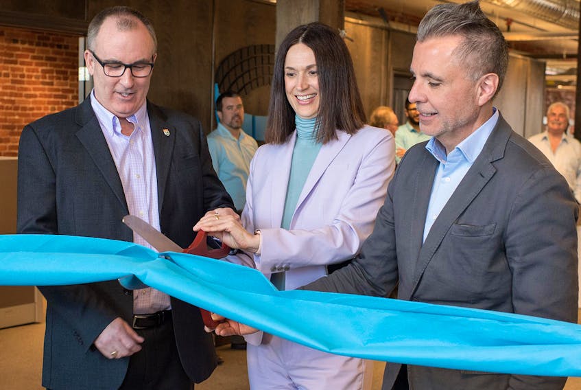IT company CareWorx recently announced it is expanding its Summerside office. It also recently moved into the Holman Building. Cutting the ribbon on the new office was Minister of Economic Development Chris Palmer, CareWorx COO, Janice Siddons, and CEO Mark Scott.