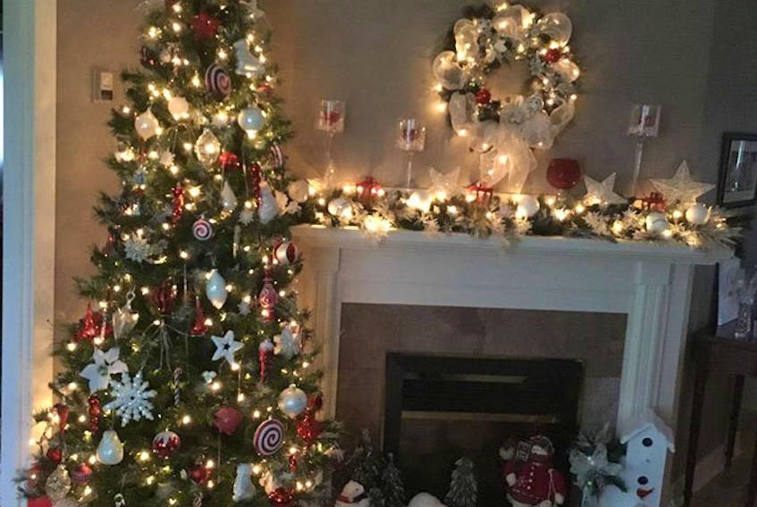 Dobie Lewis’s red and white tree and festive décor (even the gifts are matching) had 14 likes and comments.