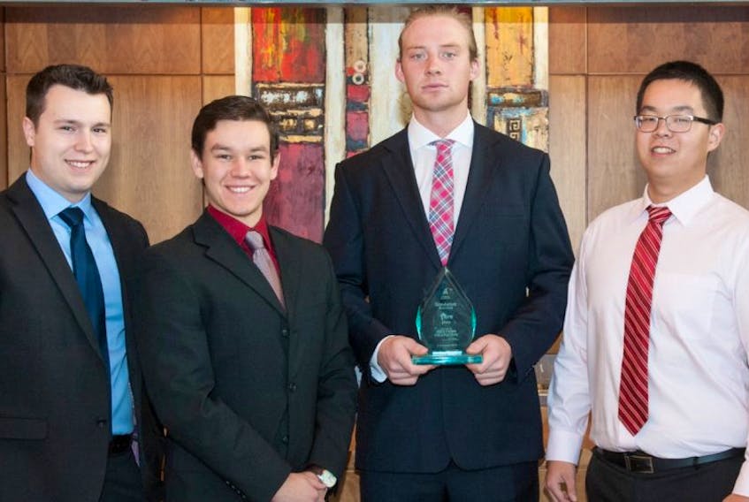 UPEI School of Business students Jordan Rose, Geoffrey Gaudet, Nick Czinder and Silei Peng took first place at a recent Interuniversity Stock Market Simulation competition.