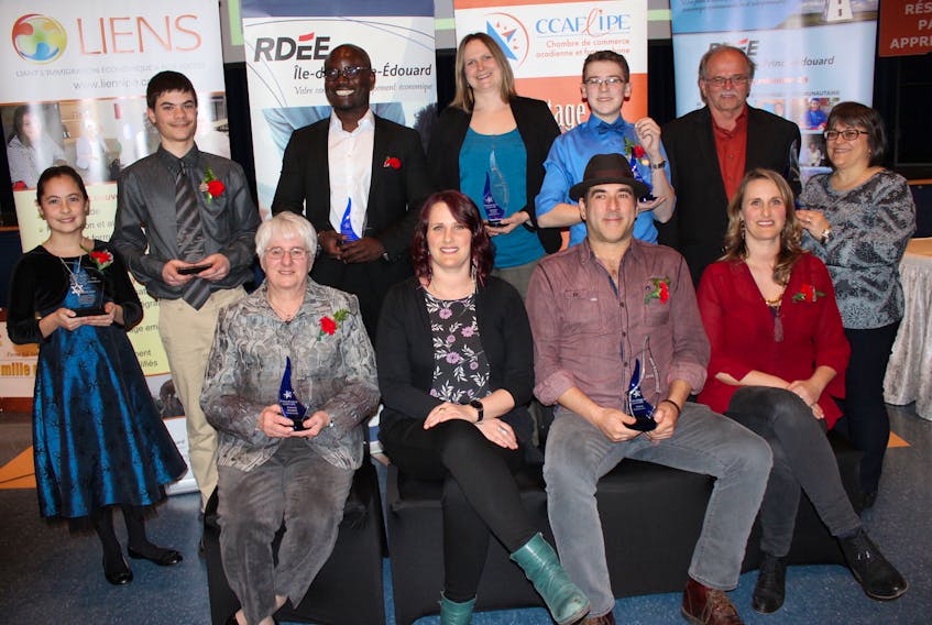 The winners from the 2018 Acadian Entrepreneurs' Gala, hosted by the Acadian and Francophone Chamber of Commerce of P.E.I., are: seated, from left, Jeannette Arsenault (2018 Distinguished Entrepreneur), Emmanuelle LeBlanc, Pascal Miousse and Pastelle LeBlanc from the group Vishten (2018 President's Award of Excellence); standing, from left, Isabelle Fisk and Nicholas Sauvé (2017 Young Millionaires), Gideon Banahene (2018 Immigrant Entrepreneur), Ghislaine Cormier (2018 Business Personality), Jérémie Buote (2018 Enterprising Youth) and
Alcide Bernard and Jeanne Gallant from the Evangeline Area Agricultural Exhibition and Acadian Festival (2018 Social Economy Business).