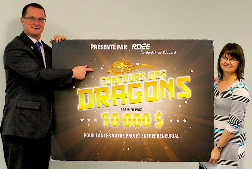 Martin Marcoux, president of RDÉE Prince Edward Island, and co-ordinator Velma Robichaud officially launch the 2018 edition of the Dragons' Contest, which offers a $10,000 grand prize.