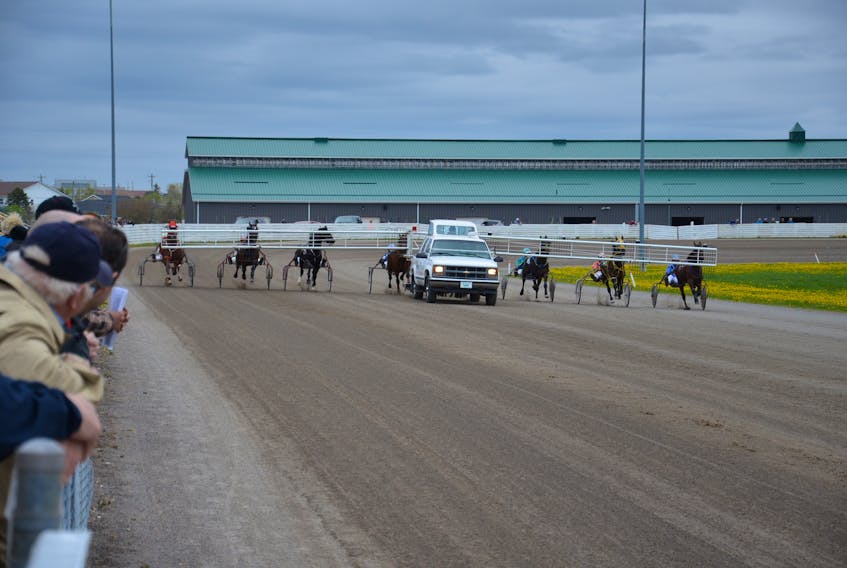 The starting gate approaches the start during a recent harness racing card at Red Shores at Summerside Raceway.