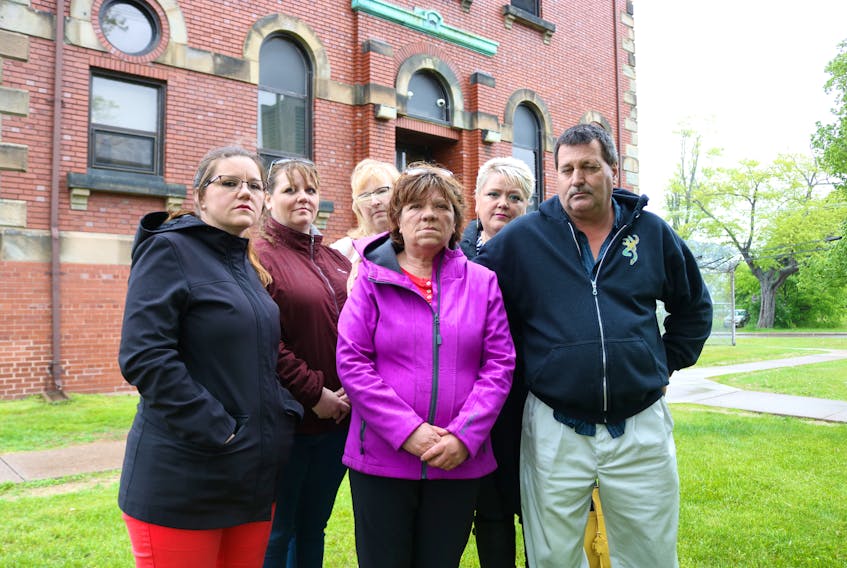 Family of Jeremy Stephens outside of the Summerside provincial court house. Gilda Stephens, centre, has hired a lawyer who, on behalf of her client, has issued letters to relevant Island institutions who may be able to provide answers to the family's questions involving the death of Jeremy Stephens.