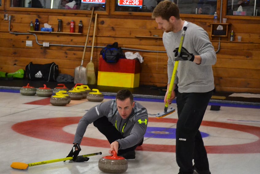 Anson Carmody, mate on the John Likely rink, prepares to seek a Steve Burgess stone during the P.E.I. Tankard provincial men's curling championship at the Western Community Curling Club in Alberton. Likely, whose team also consists of Matthew Nabuurs and Robbie Doherty, is the only undefeated team in the modified triple knock-out competition.