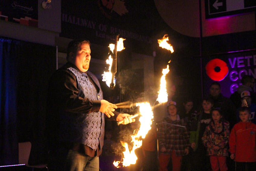 In this Journal Pioneer file photo from New Years Eve 2016, the Amazing Christose juggles fire for the crowd at Credit Union Place on Saturday, part of their New Year’s Eve festivities the complex hosted.