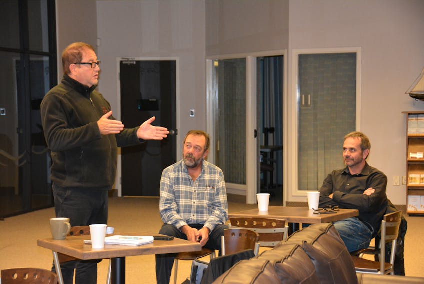 Adam Fenec, left, director of UPEI’’s Climate Lab, speaks during a public feedback session in Summrside this week regarding the adaptation section of the province’s new Climate Action Plan.