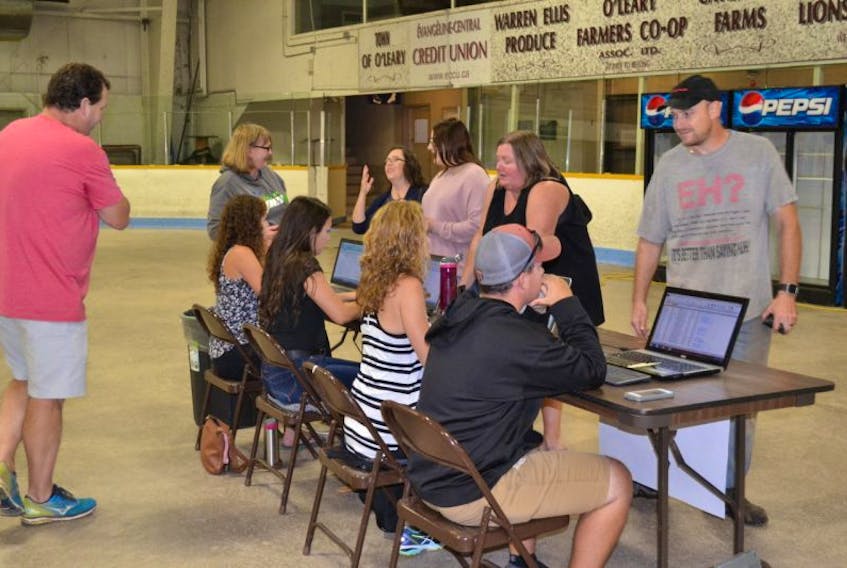 Individuals interested in getting in on draws for a chance at winning tickets to the Kraft Hockeyville NHL exhibition game in Summerside on Sept. 25, line up to enter their names in a data base Wednesday at O’Leary Community Sports Centre. There are still three more opportunities to register, September 2 and 6 at the Community Sports Centre and Sept. 10 at O’Leary Legion.
