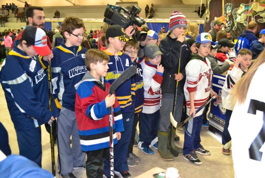 Hockey jerseys are the most popular attire at the Kraft Hockeyville announcement party underway in O’Leary.
