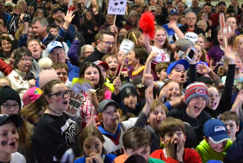 A nervous and excited crowd lets loose a cheer when NHL commissioner Gary Bettman announces on Sportsnet’s Hockey Night in Canada pre-game show that O’Leary is Kraft Hockeyville 2017. O’Leary Community Sports Centre was packed for the announcement party.