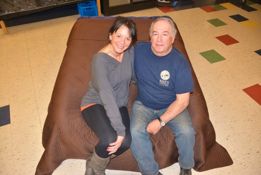 Shelley Schurman and Vernon Campbell get cozy during a rehearsal of “Bedtime Stories,” the latest offering from Summerside’s Harbourfront Players.