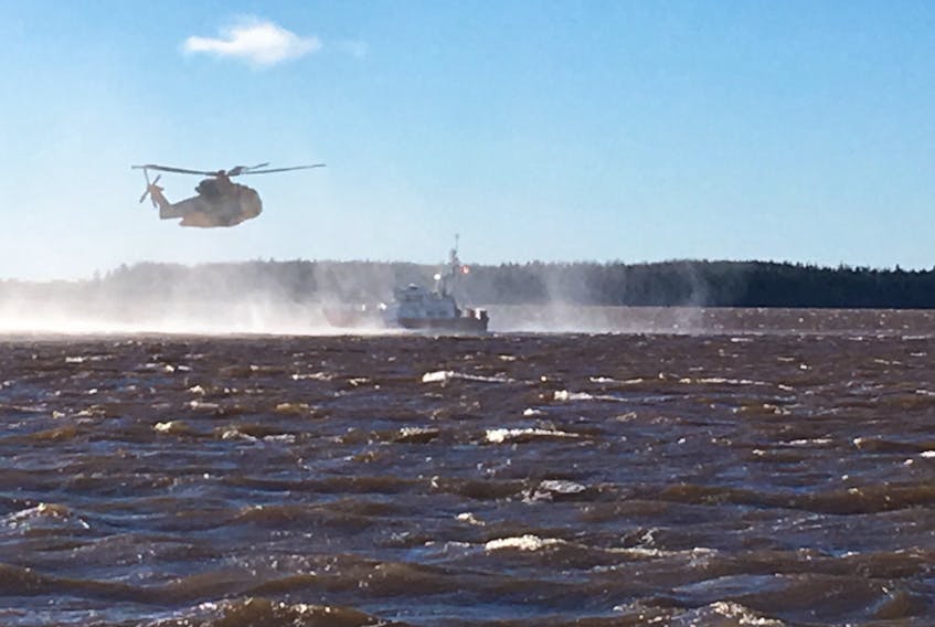 Submitted photo
A Cormorant helicopter from CFB Greenwood participates in a joint training exercise with a Coast Guard personnel off Summerside recently.